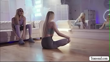 Busty shemale is doing yoga and her blonde babe partner joins her.After that,they talk for a while and they start kissing each other after.Next is,she lets her suck her hard shecock and in return,she licks her pussy first before fucking it.